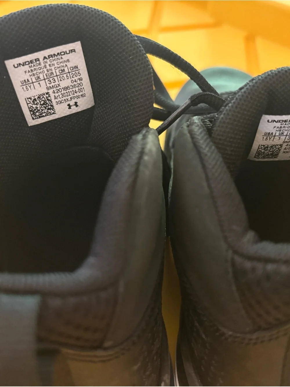 Under Armour Kids Black and White Athletic Sneakers
